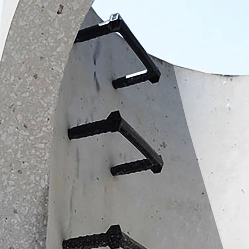 Plastic Manhole Steps installed in a concrete cylinder.